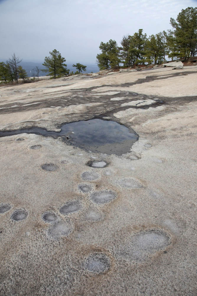 Weathering pits and pothole in granite. (vertical) – Geology Pics