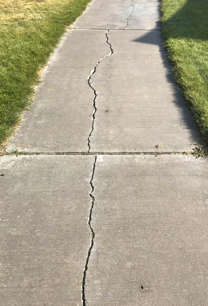 cracked-sidewalk-vertical-geology-pics