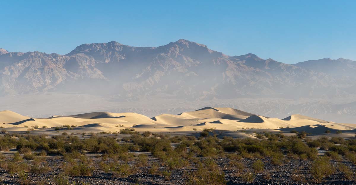 Dust and sand dunes, Death Valley, CA (pan) – Geology Pics